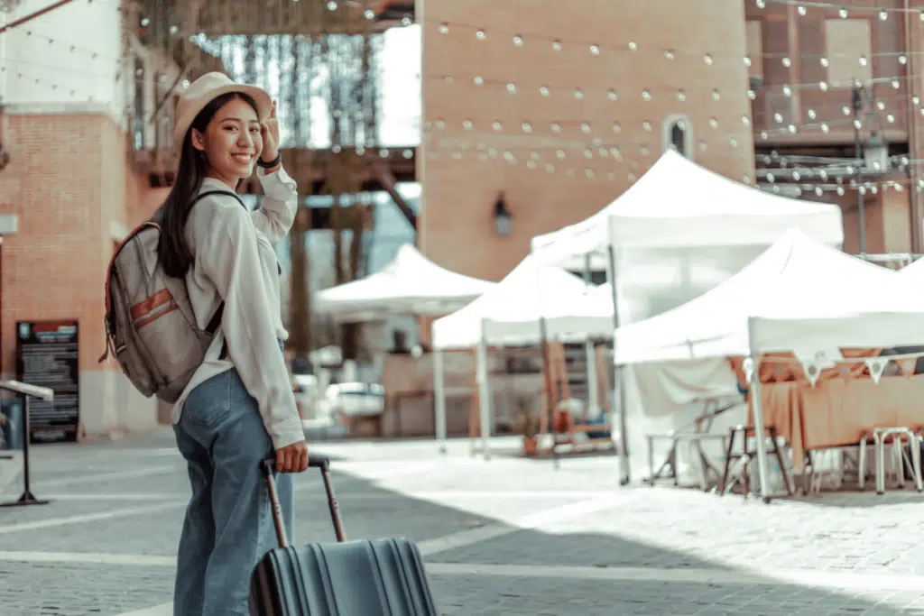 woman travelling with suitcase