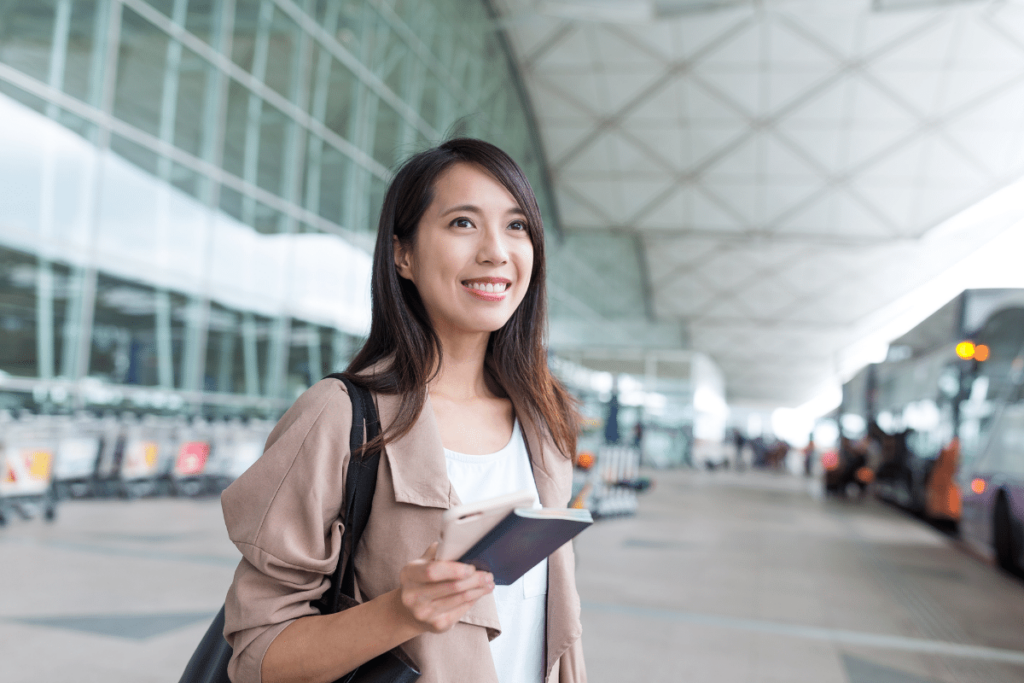 woman with British Passport at airport