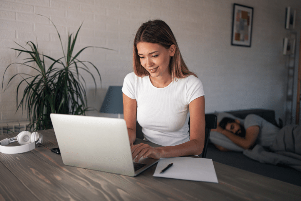 Woman on laptop applying for British passport renewal