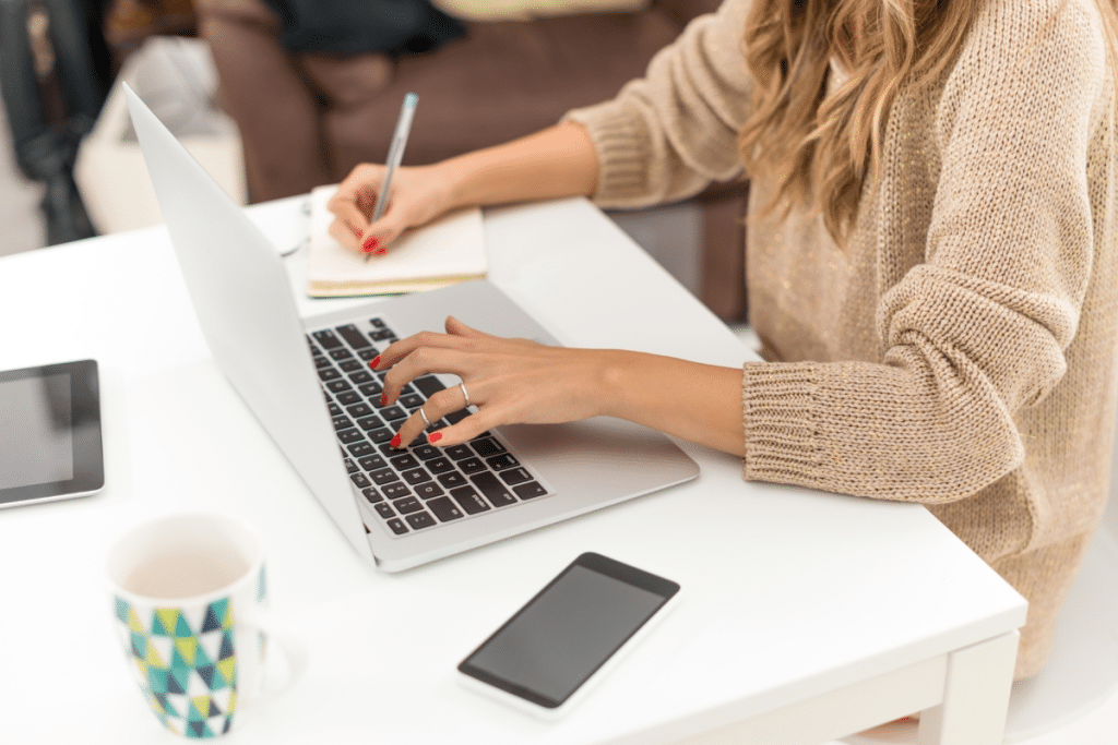 person renewing UK passport on laptop